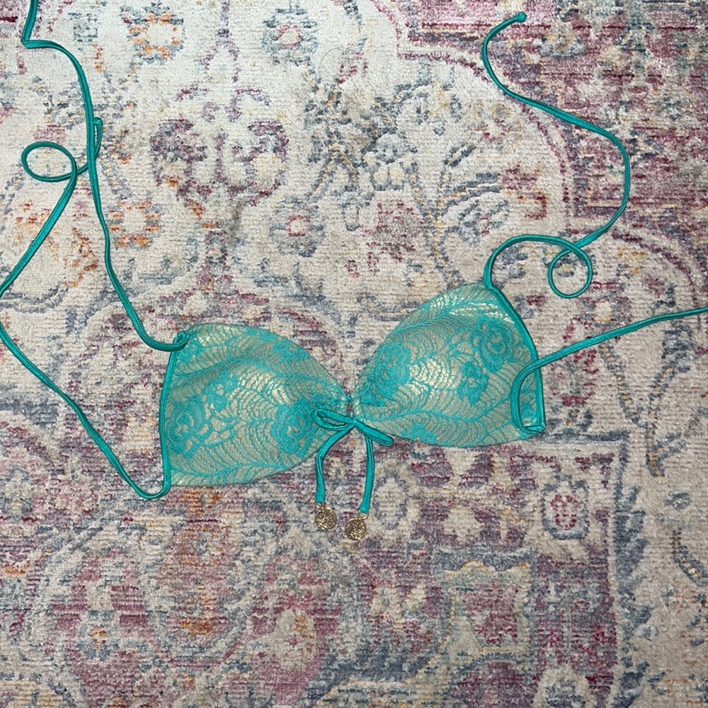 Luli fama Size M, padded top in teal/turquoise lace over lay.